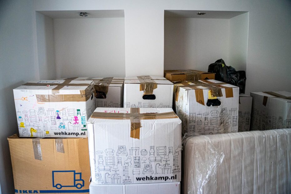 brown cardboard boxes on brown wooden table